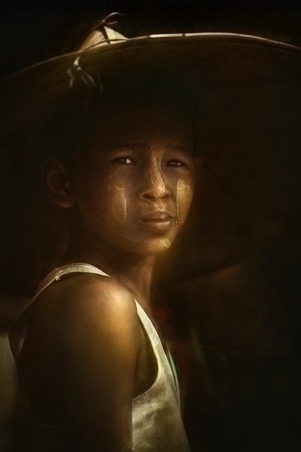 Boy with bamboo hat