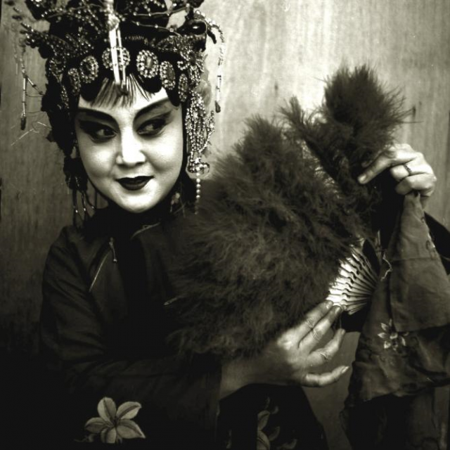 Peking Opera Actress Holding Fan, Beijing, 1996 © Liu Zheng